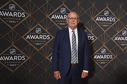 Jun 26, 2023; Nashville, Tennessee, USA; New Jersey Devils head coach Lindy Ruff arrives on the red carpet before the 2023 NHL Awards at Bridgestone Arena. Mandatory Credit: Christopher Hanewinckel-USA TODAY Sports