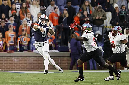 Nov 19, 2022; Auburn, Alabama, USA; Auburn Tigers quarterback Robby Ashford (9) shows a pass during the second quarter against the Western Kentucky Hilltoppers at Jordan-Hare Stadium. Mandatory Credit: John Reed-USA TODAY Sports