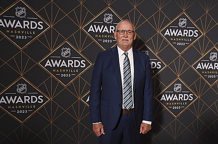 Jun 26, 2023; Nashville, Tennessee, USA; New Jersey Devils head coach Lindy Ruff arrives on the red carpet before the 2023 NHL Awards at Bridgestone Arena. Mandatory Credit: Christopher Hanewinckel-USA TODAY Sports