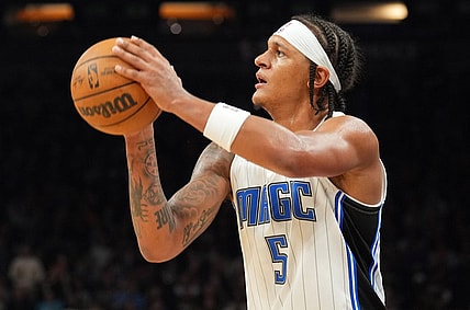 Dec 31, 2023; Phoenix, Arizona, USA; Orlando Magic forward Paolo Banchero (5) shoots against the Phoenix Suns during the second half at Footprint Center. Mandatory Credit: Joe Camporeale-USA TODAY Sports