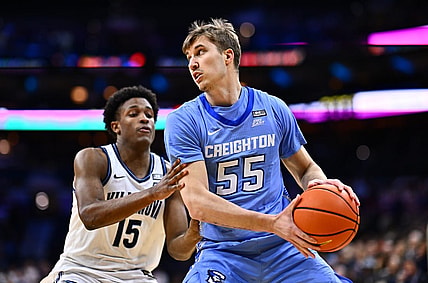 Mar 9, 2024; Philadelphia, Pennsylvania, USA; Creighton Bluejays guard Baylor Scheierman (55) controls the ball against Villanova Wildcats guard Jordan Longino (15) in the first half at Wells Fargo Center. Mandatory Credit: Kyle Ross-USA TODAY Sports