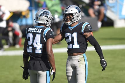 Nov 15, 2020; Charlotte, North Carolina, USA; Carolina Panthers outside linebacker Jeremy Chinn (21) and cornerback Rasul Douglas (24) react in the second quarter at Bank of America Stadium. Mandatory Credit: Bob Donnan-USA TODAY Sports