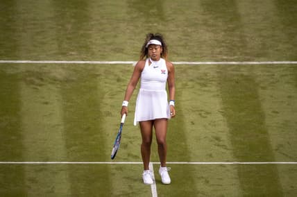 Jul 1, 2019; London, United Kingdom; Naomi Osaka (JPN) during her match against Yulia Putintseva (KAZ) on day one at the All England Lawn and Croquet Club. Mandatory Credit: Susan Mullane-USA TODAY Sports