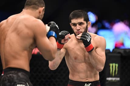 Sep 7, 2019; Abu Dhabi, UAE; Islam Makhachev (red gloves) fights Davi Ramos (blue gloves) during UFC 242 at The Arena. Mandatory Credit: Per Haljestam-USA TODAY Sports