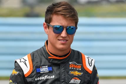 Aug 7, 2021; Watkins Glen, NY, USA; NASCAR Camping World Truck Series driver Zane Smith (21) looks on prior to the United Rentals 176 at Watkins Glen International. Mandatory Credit: Rich Barnes-USA TODAY Sports
