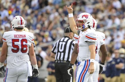Oct 9, 2021; Annapolis, Maryland, USA;  Southern Methodist Mustangs quarterback Tanner Mordecai (8) signals after a play in the first half against the Navy Midshipmen at Navy-Marine Corps Memorial Stadium. Mandatory Credit: Tommy Gilligan-USA TODAY Sports