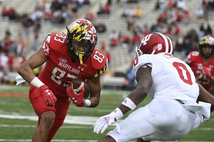 Oct 30, 2021; College Park, Maryland, USA;  Maryland Terrapins wide receiver Carlos Carriere (83) runs after the catch for a touchdown as Indiana Hoosiers quarterback Donaven McCulley (0) defends during the second half at Capital One Field at Maryland Stadium. Mandatory Credit: Tommy Gilligan-USA TODAY Sports