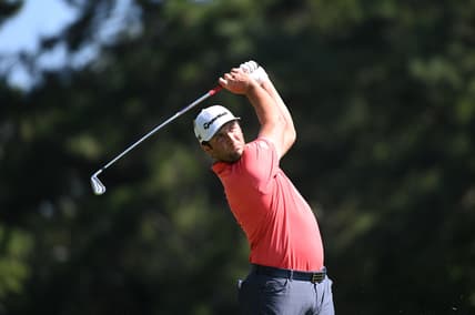 Sep 7, 2020; Atlanta, Georgia, USA; Jon Rahm hits his tee shot on the 9th hole during the final round of the Tour Championship golf tournament at East Lake Golf Club. Mandatory Credit: Adam Hagy-USA TODAY Sports