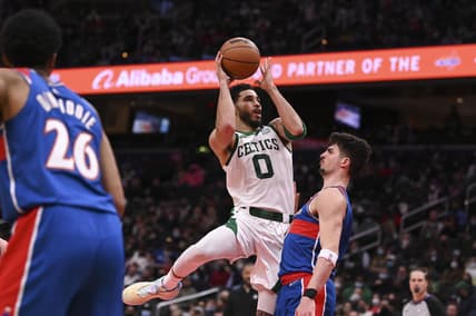 Jan 23, 2022; Washington, District of Columbia, USA;  Boston Celtics forward Jayson Tatum (0) shoots over Washington Wizards forward Deni Avdija (9) during the second half at Capital One Arena. Mandatory Credit: Tommy Gilligan-USA TODAY Sports
