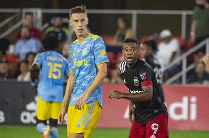 Aug 28, 2021; Washington, DC, Washington, DC, USA;  D.C. United forward Ola Kamara (9) and Philadelphia Union defender Jack Elliott (3) look down field at Audi Field. Mandatory Credit: Tommy Gilligan-USA TODAY Sports
