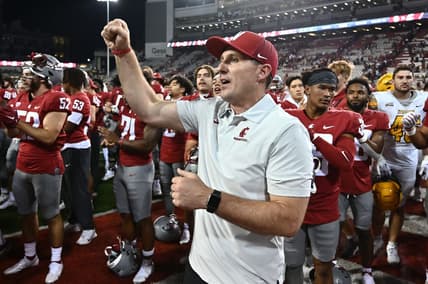 Sep 3, 2022; Pullman, Washington, USA; Washington State Cougars head coach Jake Dickert sings the school fight song after defeating the Idaho Vandals at Gesa Field at Martin Stadium. Washington State won 24-17. Mandatory Credit: James Snook-USA TODAY Sports