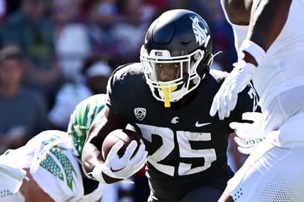 Sep 24, 2022; Pullman, Washington, USA; Washington State Cougars running back Nakia Watson (25) carries the ball against the Oregon Ducks in the first half at Gesa Field at Martin Stadium. Mandatory Credit: James Snook-USA TODAY Sports