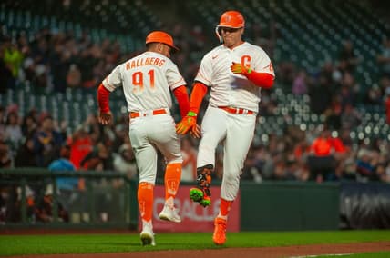 Sep 27, 2022; San Francisco, California, USA;  San Francisco Giants left fielder Joc Pederson (23) celebrates with third base coach Mark Hallberg (91) after hitting a home run during the first inning against the Colorado Rockies at Oracle Park. Mandatory Credit: Ed Szczepanski-USA TODAY Sports