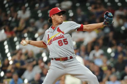 Jun 21, 2022; Milwaukee, Wisconsin, USA; St. Louis Cardinals relief pitcher Giovanny Gallegos (65) delivers a pitch in the sixth inning against the Milwaukee Brewers at American Family Field. Mandatory Credit: Michael McLoone-USA TODAY Sports