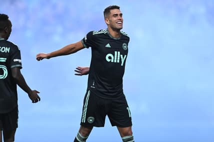Oct 1, 2022; Charlotte, North Carolina, USA; Charlotte FC attacker Daniel Rios (12) celebrates goal scored in the second half against Philadelphia Union at Bank of America Stadium. Mandatory Credit: Griffin Zetterberg-USA TODAY Sports