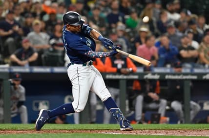 Oct 3, 2022; Seattle, Washington, USA; Seattle Mariners designated hitter Julio Rodriguez (44) hits a single against the Detroit Tigers during the third inning at T-Mobile Park. Mandatory Credit: Steven Bisig-USA TODAY Sports