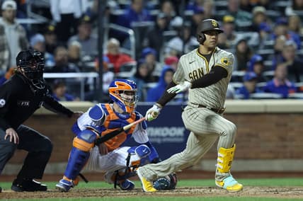 Oct 8, 2022; New York City, New York, USA; San Diego Padres right fielder Juan Soto (22) gets a hit in the fifth inning during game two of the Wild Card series against the New York Mets for the 2022 MLB Playoffs at Citi Field. Mandatory Credit: Brad Penner-USA TODAY Sports