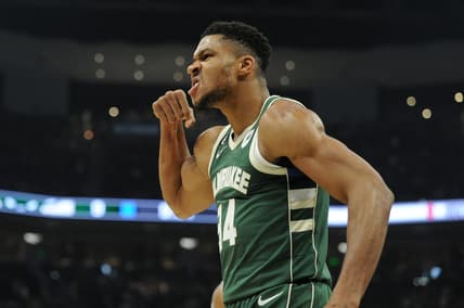 Oct 22, 2022; Milwaukee, Wisconsin, USA; Milwaukee Bucks forward Giannis Antetokounmpo (34) mean mugs to the audience after powering his way to the basket and being fouled by a Houston Rockets player in the first quarter at Fiserv Forum. Mandatory Credit: Michael McLoone-USA TODAY Sports