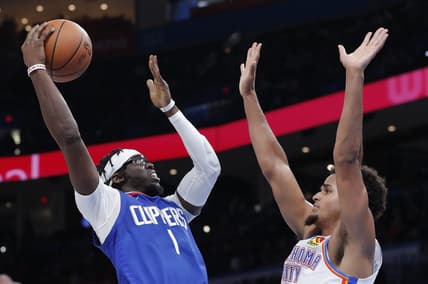 Oct 25, 2022; Oklahoma City, Oklahoma, USA; LA Clippers guard Reggie Jackson (1) shoots as Oklahoma City Thunder forward Jeremiah Robinson-Earl (50) defends the shot during the second half at Paycom Center. Oklahoma City won 108-94. Mandatory Credit: Alonzo Adams-USA TODAY Sports