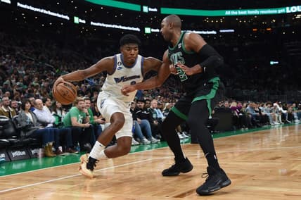 Oct 30, 2022; Boston, Massachusetts, USA;  Washington Wizards forward Rui Hachimura (8) controls the ball while Boston Celtics center Al Horford (42) defends during the first half at TD Garden. Mandatory Credit: Bob DeChiara-USA TODAY Sports