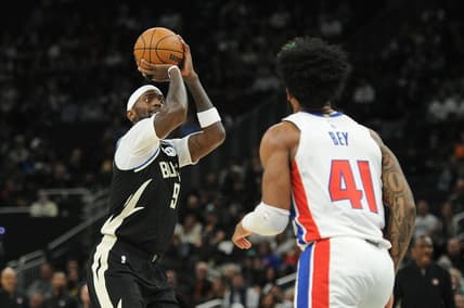 Oct 31, 2022; Milwaukee, Wisconsin, USA; Milwaukee Bucks forward Bobby Portis (9) shoots the ball against Detroit Pistons forward Saddiq Bey (41) in the second quarter at Fiserv Forum. Mandatory Credit: Michael McLoone-USA TODAY Sports