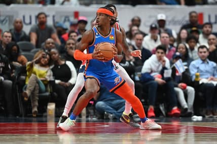Nov 16, 2022; Washington, District of Columbia, USA;  Oklahoma City Thunder guard Shai Gilgeous-Alexander (2) looks to shoot on Washington Wizards forward Kyle Kuzma (33) during the fourth quarter at Capital One Arena. Mandatory Credit: Tommy Gilligan-USA TODAY Sports