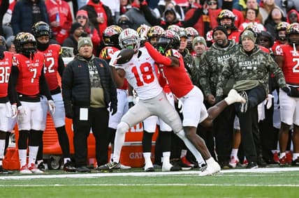 Nov 19, 2022; College Park, Maryland, USA;  Ohio State Buckeyes wide receiver Marvin Harrison Jr. (18) catches a pass as Maryland Terrapins defensive back Deonte Banks (3) defends during the first quarter at SECU Stadium. Mandatory Credit: Tommy Gilligan-USA TODAY Sports