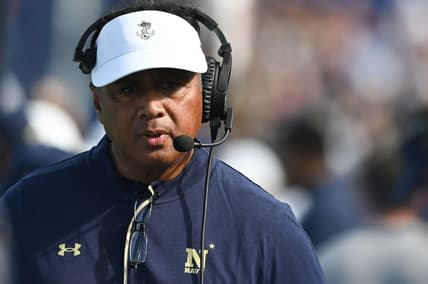Sep 10, 2022; Annapolis, Maryland, USA;  Navy Midshipmen head coach Ken Niumatalolo walks through the bench during the first half against the Memphis Tigers at Navy-Marine Corps Memorial Stadium. Mandatory Credit: Tommy Gilligan-USA TODAY Sports