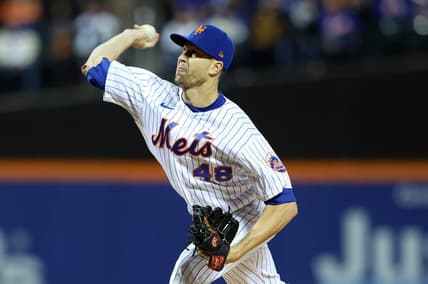 Oct 8, 2022; New York City, New York, USA; New York Mets starting pitcher Jacob deGrom (48) throws a pitch in the first inning during  game two of the Wild Card series against the San Diego Padres for the 2022 MLB Playoffs at Citi Field. Mandatory Credit: Brad Penner-USA TODAY Sports