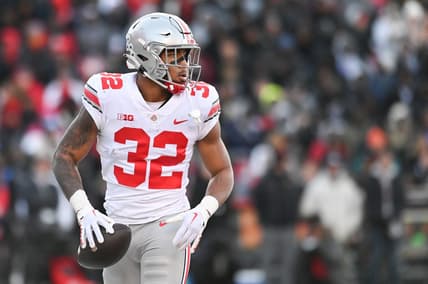 Nov 19, 2022; College Park, Maryland, USA; Ohio State Buckeyes running back TreVeyon Henderson (32) reacts after scoring a first quarter touchdown against the Maryland Terrapins  at SECU Stadium. Mandatory Credit: Tommy Gilligan-USA TODAY Sports