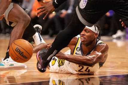 Nov 30, 2022; Sacramento, California, USA; New Orleans Pelicans guard Buddy Hield (24) attempts to pass the ball from the floor during the second quarter of the game against the Sacramento Kings at Golden 1 Center. Mandatory Credit: Ed Szczepanski-USA TODAY Sports