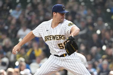 Oct 2, 2022; Milwaukee, Wisconsin, USA;  Milwaukee Brewers relief pitcher Justin Topa (56) delivers a pitch in the sixth inning against the Miami Marlins at American Family Field. Mandatory Credit: Michael McLoone-USA TODAY Sports
