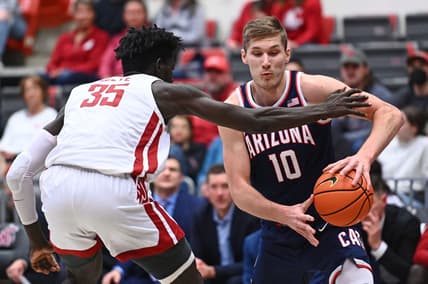 Jan 26, 2023; Pullman, Washington, USA; Arizona Wildcats forward Azuolas Tubelis (10) runs the baseline against Washington State Cougars forward Mouhamed Gueye (35) in the first half at Friel Court at Beasley Coliseum. Mandatory Credit: James Snook-USA TODAY Sports