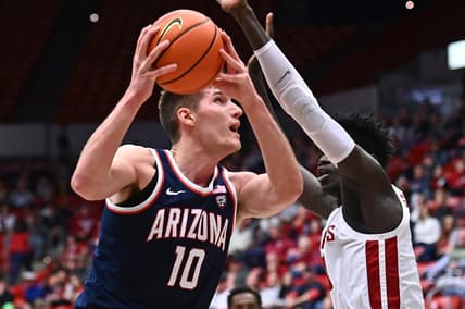 Jan 26, 2023; Pullman, Washington, USA;  Arizona Wildcats forward Azuolas Tubelis (10) shoots the ball against Washington State Cougars forward Mouhamed Gueye (35)in the first half at Friel Court at Beasley Coliseum. Mandatory Credit: James Snook-USA TODAY Sports