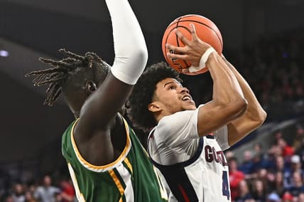 Feb 9, 2023; Spokane, Washington, USA; Gonzaga Bulldogs guard Rasir Bolton (45) shoots the ball against San Francisco Dons forward Ndewedo Newbury (21) in the second half at McCarthey Athletic Center. Mandatory Credit: James Snook-USA TODAY Sports