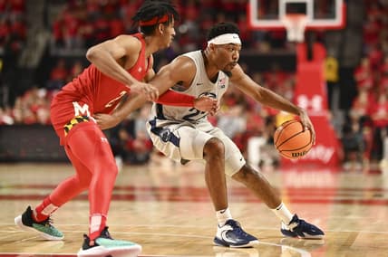 Feb 11, 2023; College Park, Maryland, USA;  Penn State Nittany Lions guard Dallion Johnson (23) spins on Maryland Terrapins guard Ian Martinez (23) during the first half at Xfinity Center. Mandatory Credit: Tommy Gilligan-USA TODAY Sports