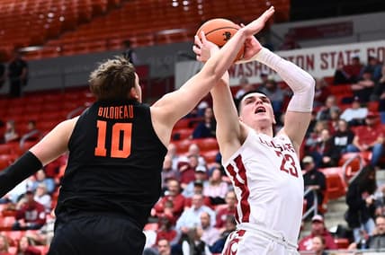 Feb 16, 2023; Pullman, Washington, USA; Washington State Cougars forward Andrej Jakimovski (23) shoots the ball against Oregon State Beavers forward Tyler Bilodeau (10) in the second half at Friel Court at Beasley Coliseum. Washington State won 80-62. Mandatory Credit: James Snook-USA TODAY Sports