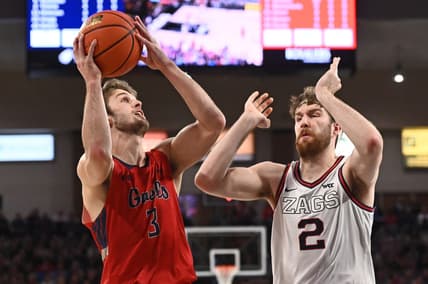 Feb 25, 2023; Spokane, Washington, USA; St. Mary's Gaels guard Augustas Marciulionis (3) shoots against Gonzaga Bulldogs forward Drew Timme (2) in the first half at McCarthey Athletic Center. Mandatory Credit: James Snook-USA TODAY Sports