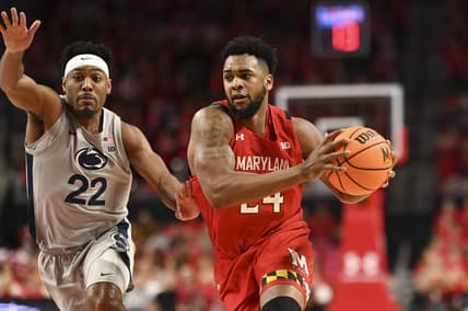 Feb 11, 2023; College Park, Maryland, USA;  Maryland Terrapins forward Donta Scott (24) makes a move to the basket as Penn State Nittany Lions guard Jalen Pickett (22) defends during the second half at Xfinity Center. Mandatory Credit: Tommy Gilligan-USA TODAY Sports
