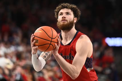 Feb 25, 2023; Spokane, Washington, USA; St. Mary's Gaels guard Logan Johnson (0) shoots the ball against the Gonzaga Bulldogs in the second half at McCarthey Athletic Center. Mandatory Credit: James Snook-USA TODAY Sports