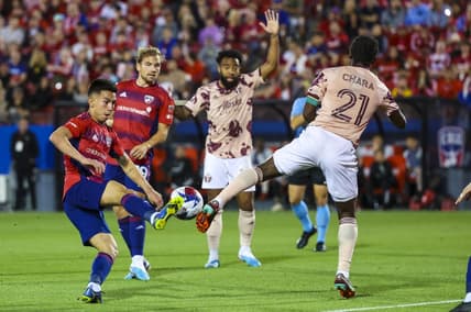Apr 1, 2023; Frisco, Texas, USA;  FC Dallas forward Alan Velasco (20) and Portland Timbers midfielder Diego Chara (21) go for the ball during the first half at Toyota Stadium. Mandatory Credit: Kevin Jairaj-USA TODAY Sports