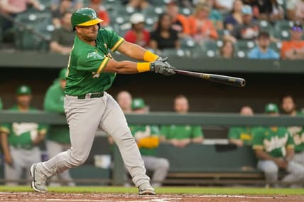 Apr 12, 2023; Baltimore, Maryland, USA;  Oakland Athletics catcher Carlos Perez (44) singles during the second inning against the Baltimore Orioles at Oriole Park at Camden Yards. Mandatory Credit: Tommy Gilligan-USA TODAY Sports
