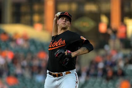 Apr 21, 2023; Baltimore, Maryland, USA;  Baltimore Orioles starting pitcher Tyler Wells (68) throws a first inning pitch against the Detroit Tigers at Oriole Park at Camden Yards. Mandatory Credit: Tommy Gilligan-USA TODAY Sports