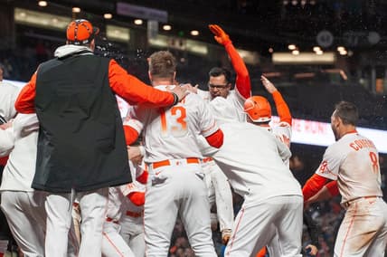 Apr 25, 2023; San Francisco, California, USA;  San Francisco Giants catcher Blake Sabol (2) celebrates with teammates after hitting a walk off home run during the ninth inning against the St. Louis Cardinals at Oracle Park. Mandatory Credit: Ed Szczepanski-USA TODAY Sports