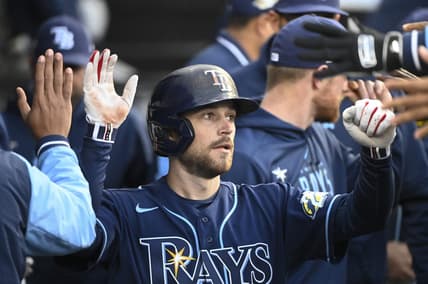 Apr 27, 2023; Chicago, Illinois, USA; Tampa Bay Rays second baseman Brandon Lowe (8) celebrates in the dugout after scoring against the Chicago White Sox during the second inning at Guaranteed Rate Field. Mandatory Credit: Matt Marton-USA TODAY Sports