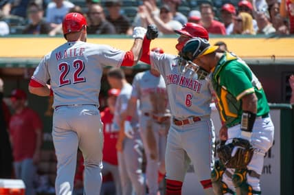 Apr 29, 2023; Oakland, California, USA; Cincinnati Reds second baseman Jonathan India (6) congratulates catcher Luke Maile (22) after he hit a home run during the second inning against the Oakland Athletics at RingCentral Coliseum. Mandatory Credit: Ed Szczepanski-USA TODAY Sports
