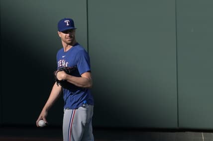 May 26, 2023; Baltimore, Maryland, USA;  Texas Rangers starting pitch Jacob deGrom stands in the outfield before the game against the Baltimore Orioles at Oriole Park at Camden Yards. Mandatory Credit: Tommy Gilligan-USA TODAY Sports
