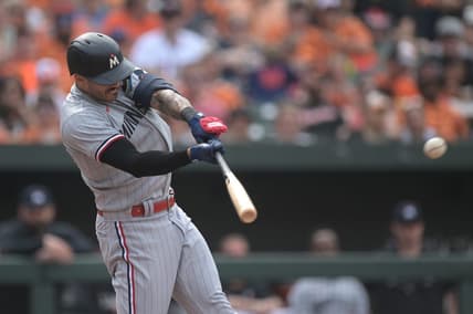 Jul 1, 2023; Baltimore, Maryland, USA; Minnesota Twins shortstop Carlos Correa (4) singles to right field during the third inning against the Baltimore Orioles  at Oriole Park at Camden Yards. Mandatory Credit: Tommy Gilligan-USA TODAY Sports