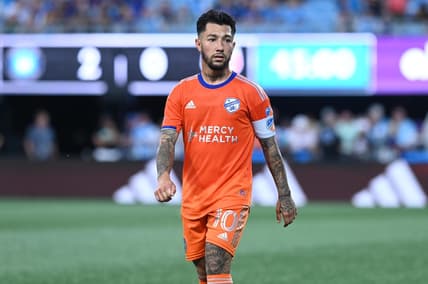 Jul 8, 2023; Charlotte, North Carolina, USA; FC Cincinnati midfielder Luciano Acosta (10) looks down the field in the first half against Charlotte FC at Bank of America Stadium. Mandatory Credit: Griffin Zetterberg-USA TODAY Sportsfc