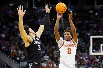 Mar 24, 2023; Kansas City, MO, USA; Texas Longhorns guard Arterio Morris (2) shoots against Xavier Musketeers guard Colby Jones (3) during the first half of an NCAA tournament Midwest Regional semifinal at T-Mobile Center. Mandatory Credit: Jay Biggerstaff-USA TODAY Sports